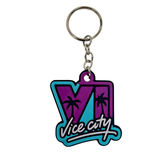 Llavero Vice City 3D Beetle Print en morado y turquesa con diseño tropical y acabado en relieve
