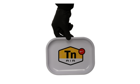 Top view of white metal rolling tray with graphic signal design