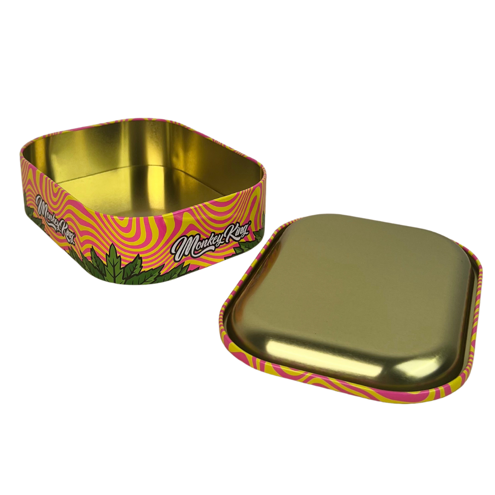 Caja metálica Beetle Print Monkey King abierta mostrando el interior dorado y la tapa decorada