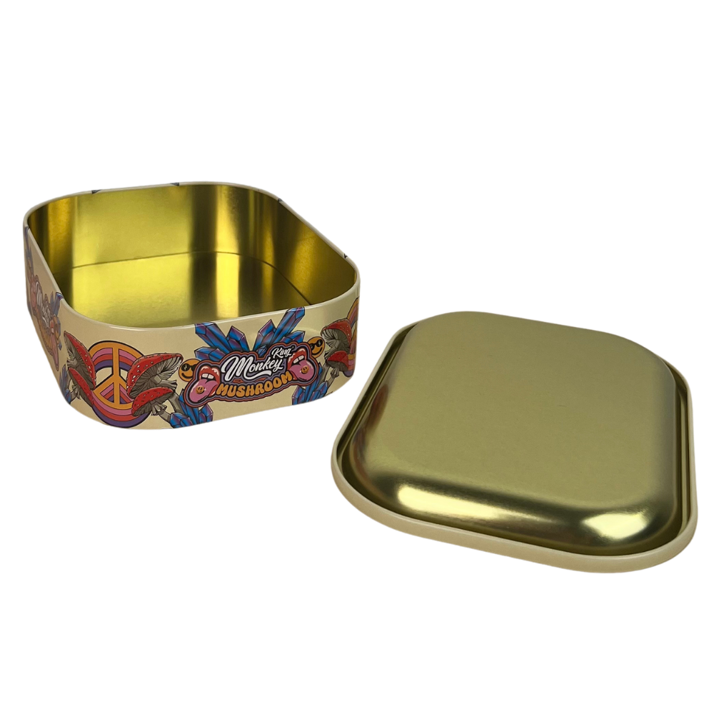 Caja metálica Beetle Print Monkey King Mushroom mostrada en vista lateral con acabado beige y diseño psicodélico