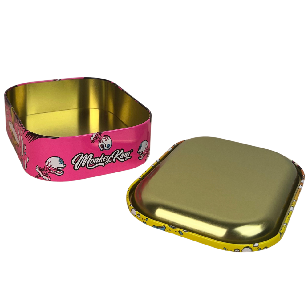 Caja metálica Beetle Print Monkey King Skull Explosion mostrada en vista lateral con acabado rosa y diseño gráfico de calavera