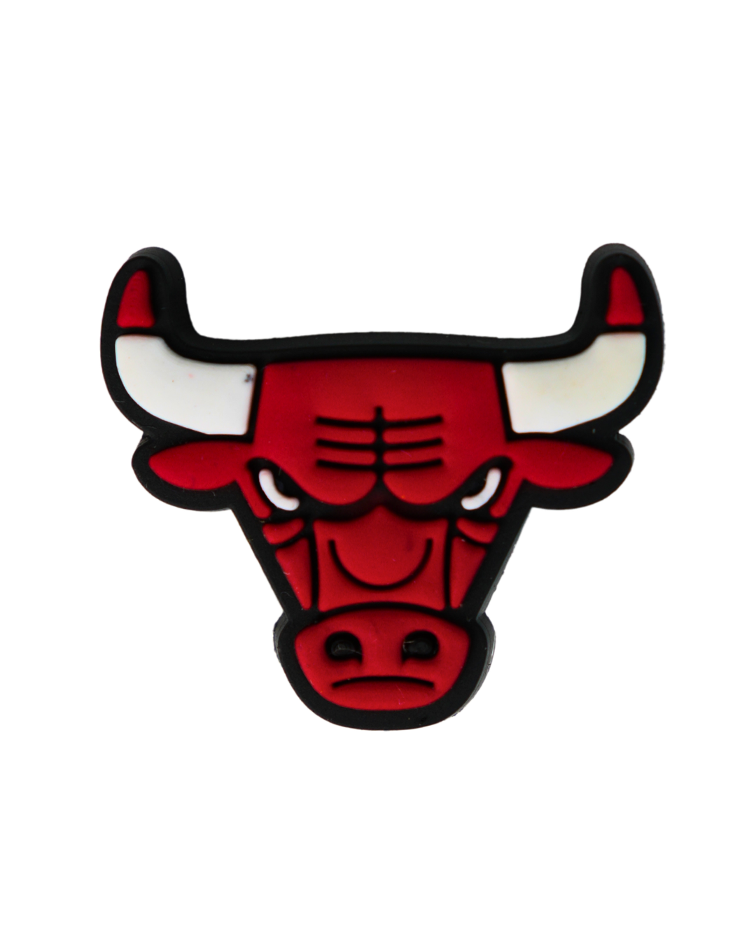 Charm de silicona con diseño de toro rojo.