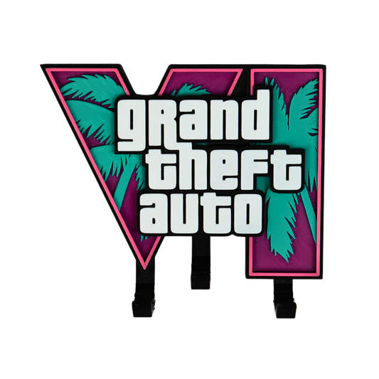 Vista frontal del colgador de llaves GTA VI impreso en 3D con tres ganchos y pequeño defecto estético en los enganches.