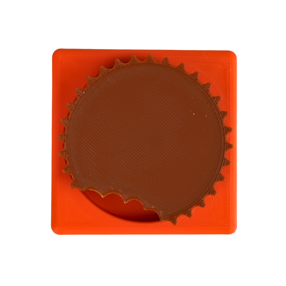 fidget antiestrés beetle print chocolate peanut cup vista superior efecto mordido