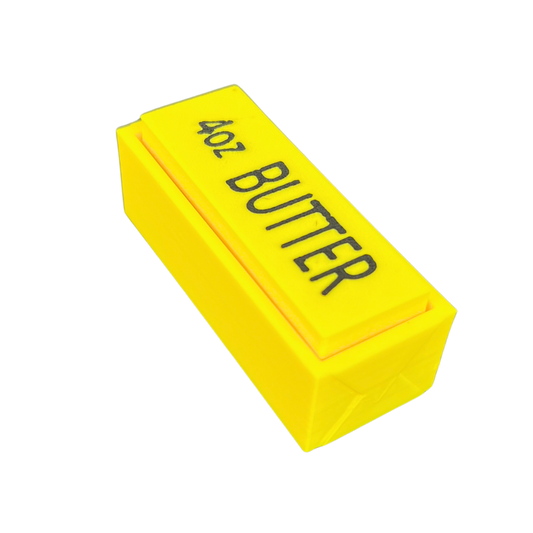 Fidget antiestrés Clicker Butter Beetle Print amarillo fabricado en 3D con diseño inspirado en una barra de mantequilla