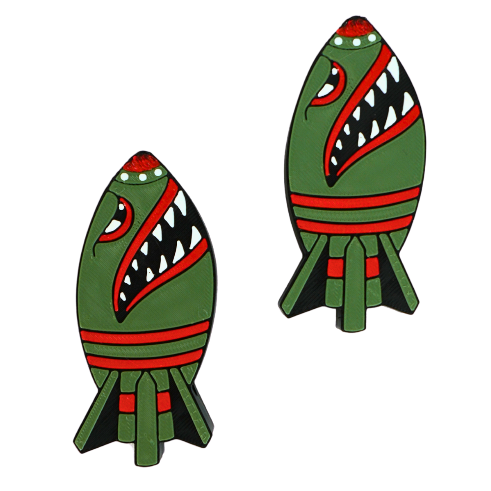 Detalle de las fundas para mechero Beetle Print con diseño de misil mostrando el pequeño fallo estético de impresión