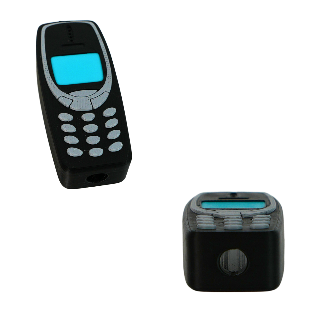 Funda Nokia para mechero BIC impresa en 3D con agujero inferior para rellenar el gas