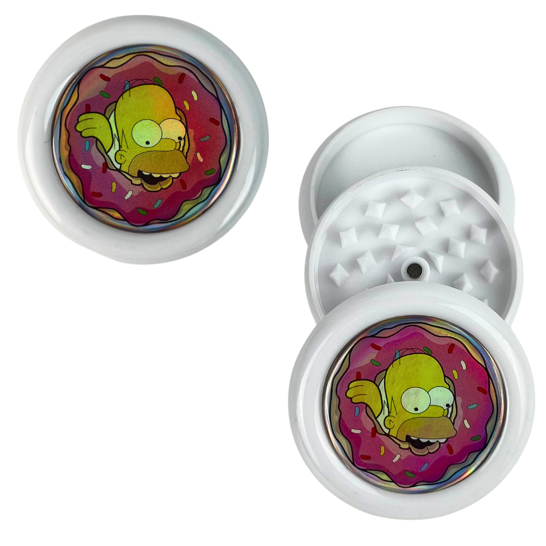 Grinder blanco Beetle Print con tapa holográfica y diseño de personaje dentro de un donut rosa.