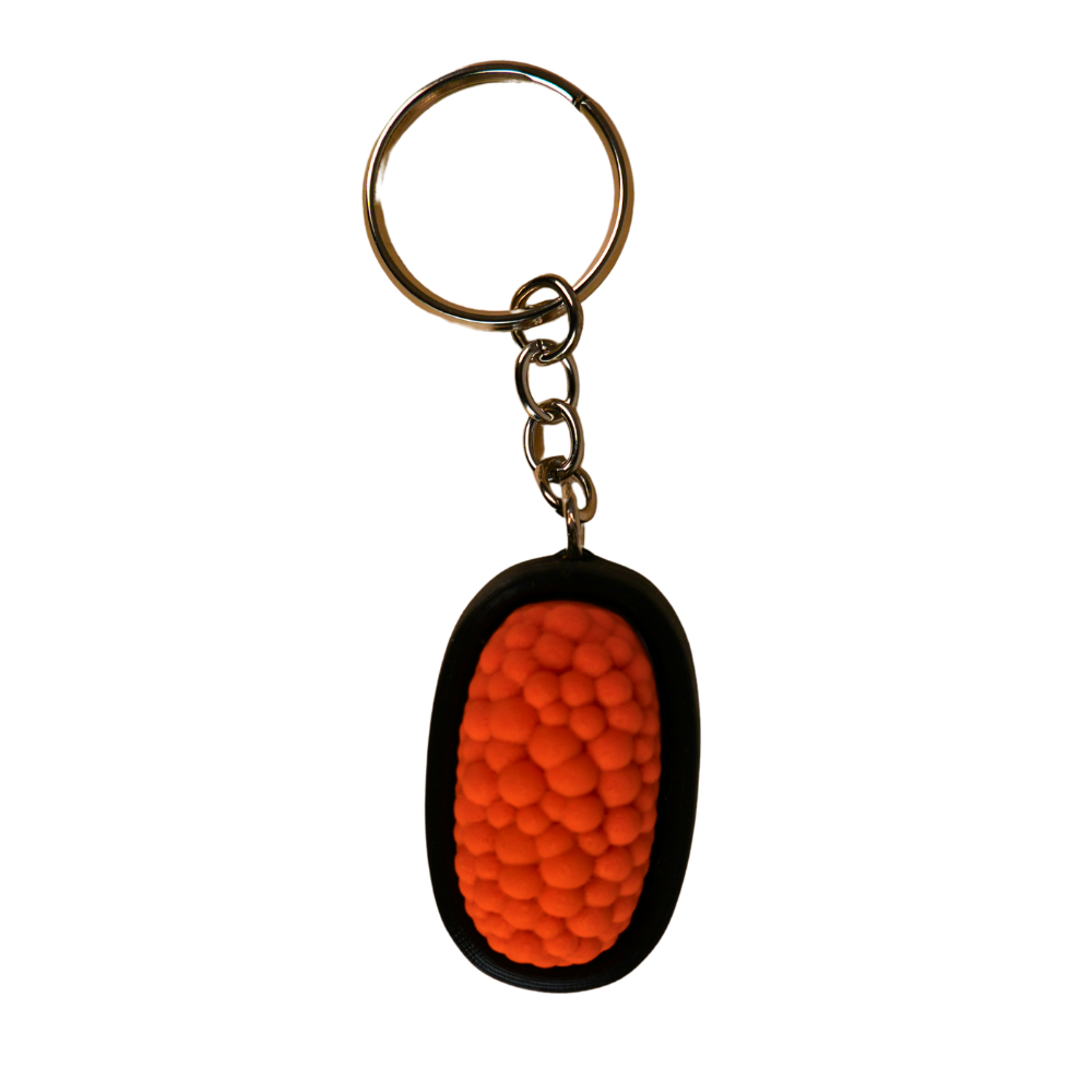 llavero antiestrés beetle print diseño sushi vista frontal con textura tipo huevas