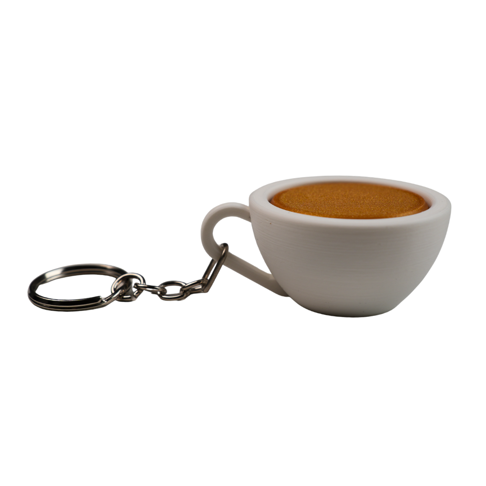 llavero antiestrés beetle print taza de café vista superior con superficie lisa