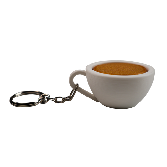 llavero antiestrés beetle print taza de café vista superior con superficie lisa