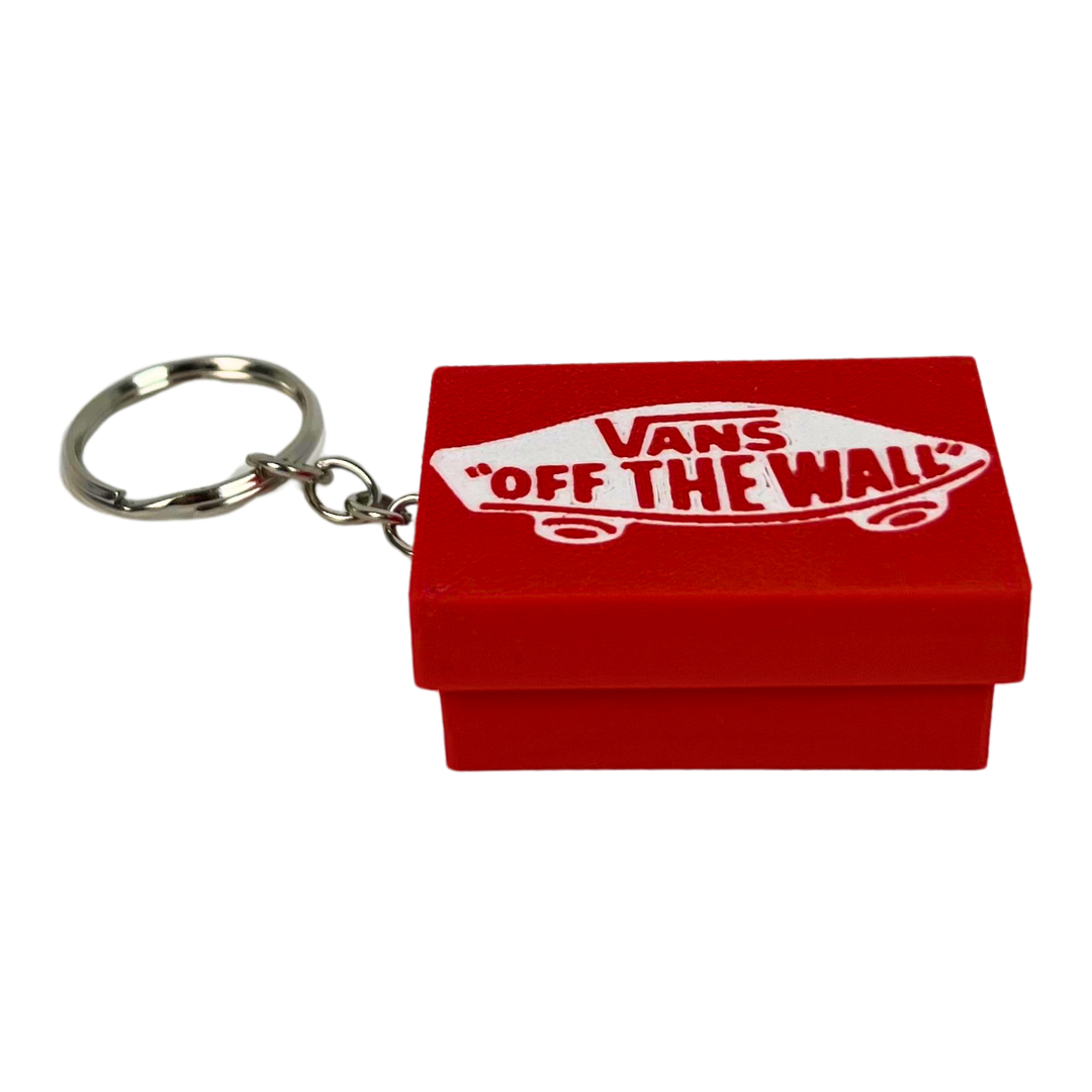Llavero clicker Beetle Print con diseño de caja de zapatillas roja estilo skate y mecanismo antiestrés, vista principal