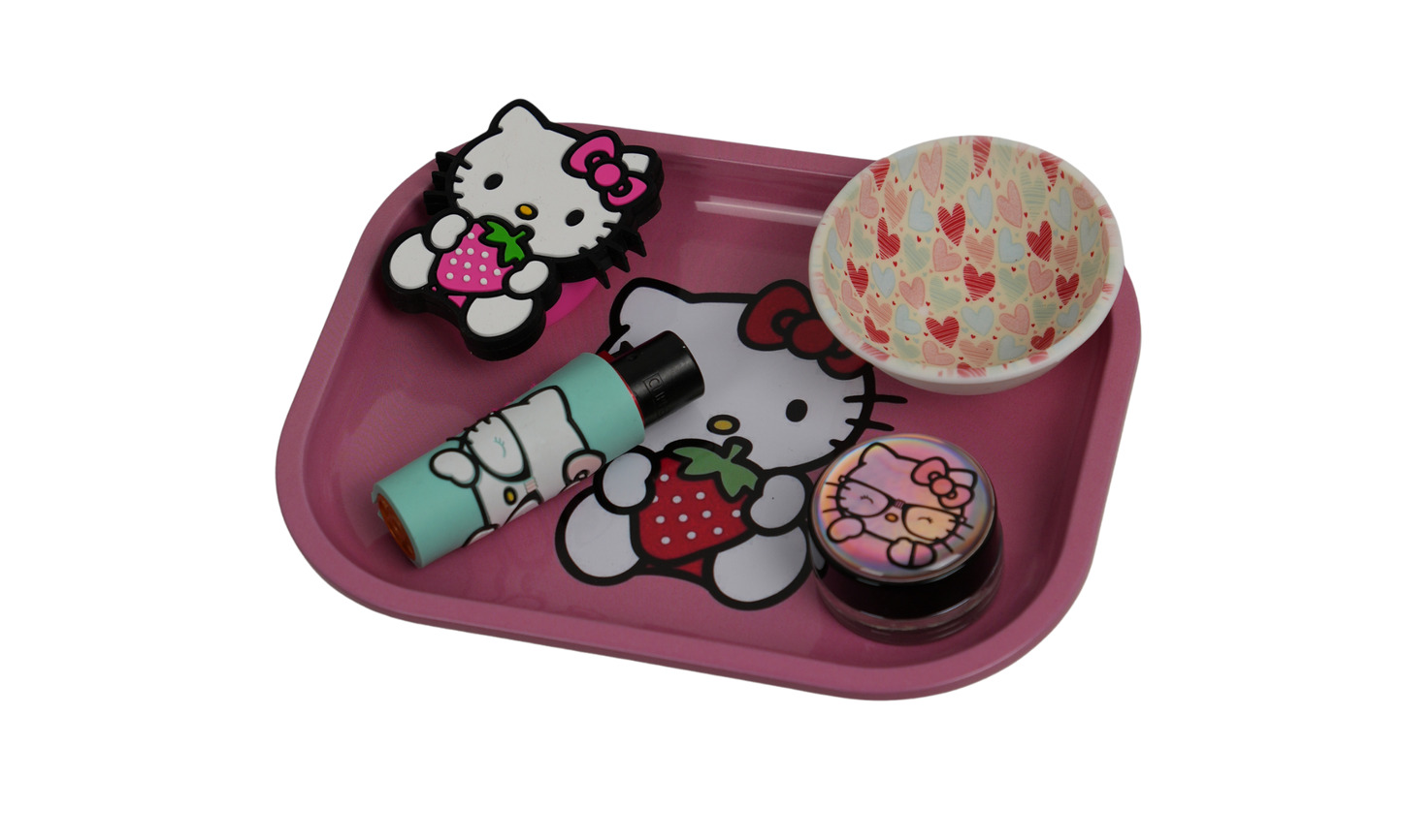 Detail of pink metal rolling tray with raised edges