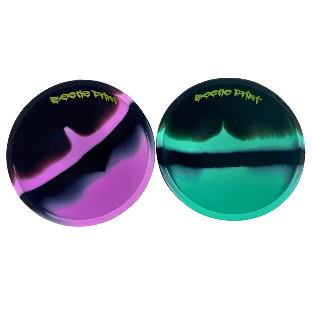 Pack de 2 bowls de silicona Beetle Print Black Color Mix en negro, turquesa y morado mostrados en conjunto