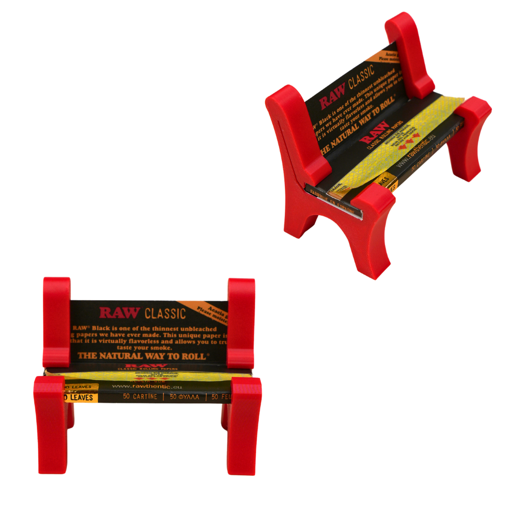 Banco sujeta papeles Beetle Print en color rojo, con el papel de liar RAW Classic incluido, diseño original y compacto