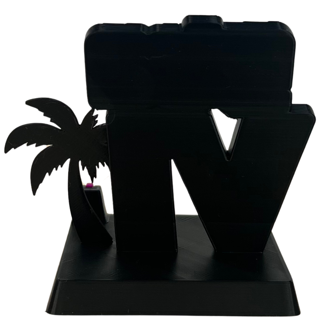 Vista trasera del soporte para móvil Beetle Print mostrando su estructura 3D, silueta de palmera y soporte vertical