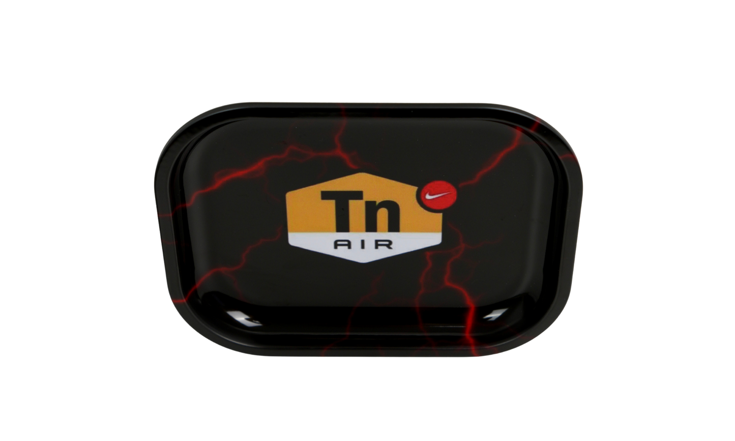 Top view of black metal rolling tray with red lightning details