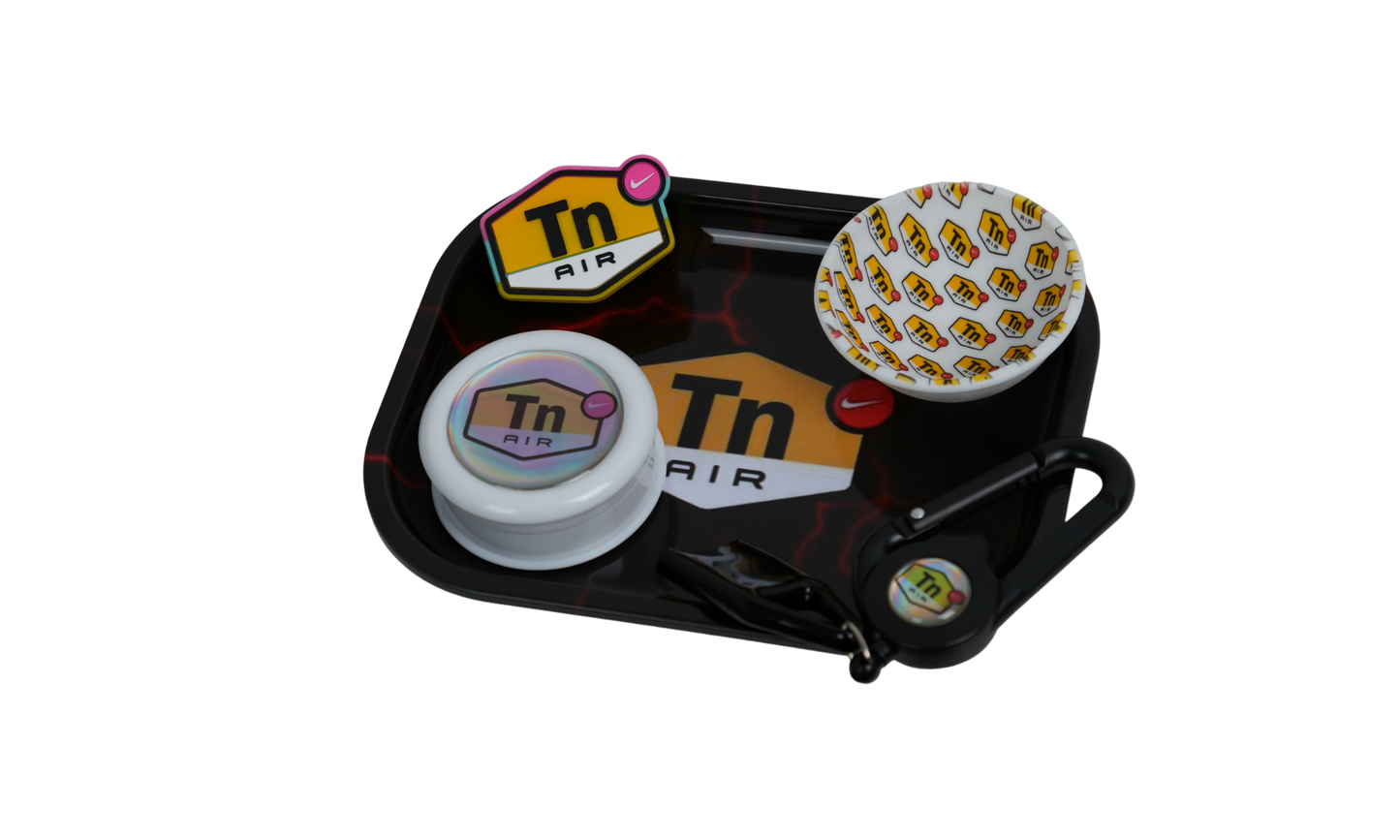 Metal rolling tray used as rolling surface with dark graphic design