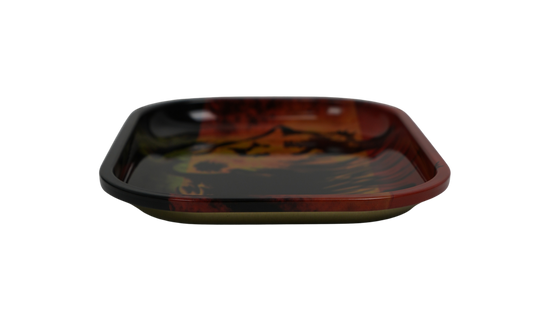 Angled view of metal rolling tray with raised edges and glossy finish