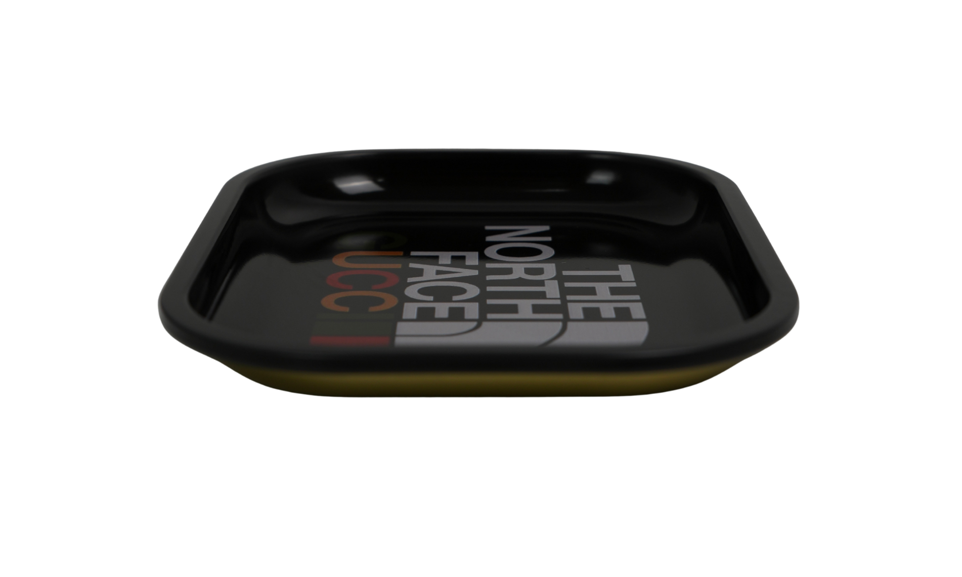 Angled view of black metal rolling tray with glossy finish
