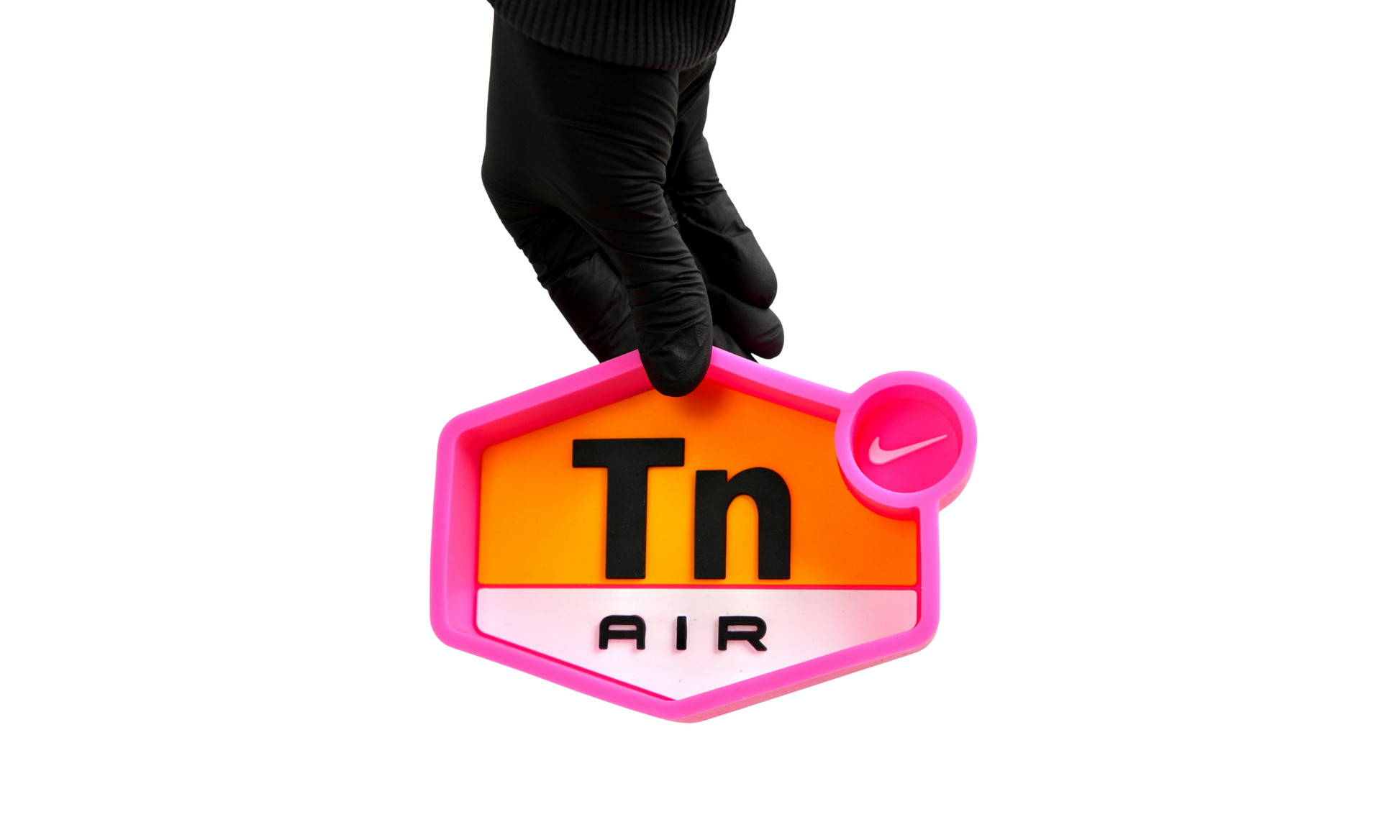 Pink silicone ashtray in use 
