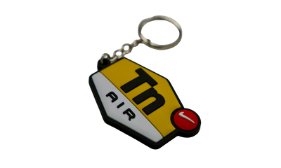 Silicone keychain angled view showing thickness and shape