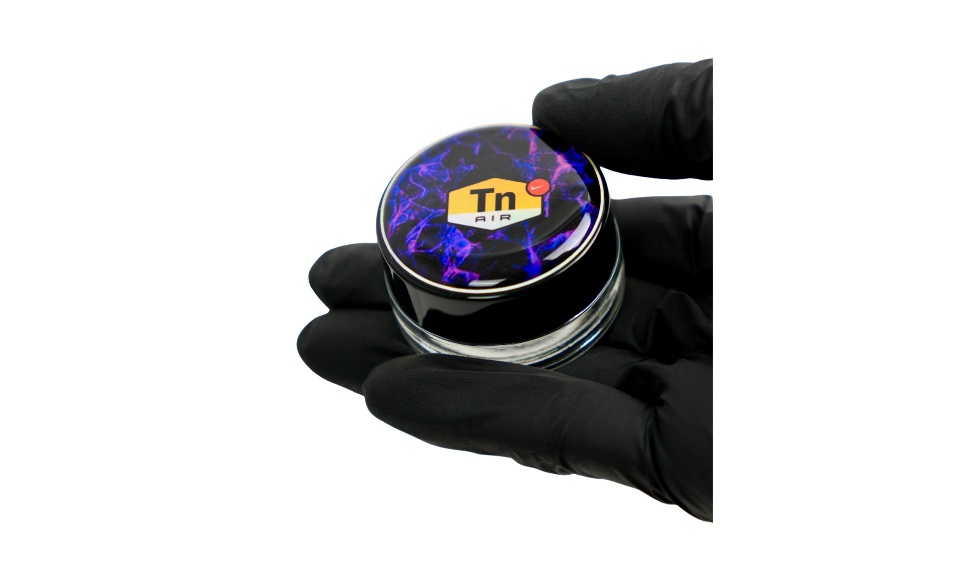 Tarro de vidrio de 5 ml con logo DIR eléctrico azul y acabado en resina premium sobre mano de Beetle Print