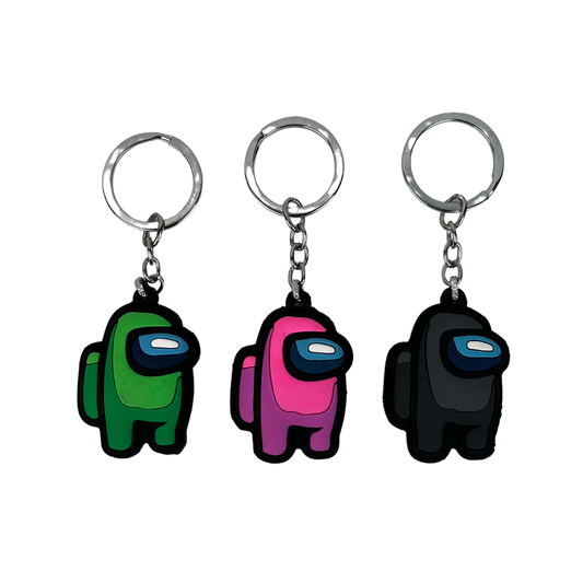 Pack de 3 llaveros de silicona con personaje espacial estilo cartoon en verde rosa y negro
