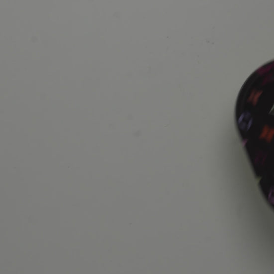 Video showcasing metal rolling tray with multicolor pattern design and glossy finish