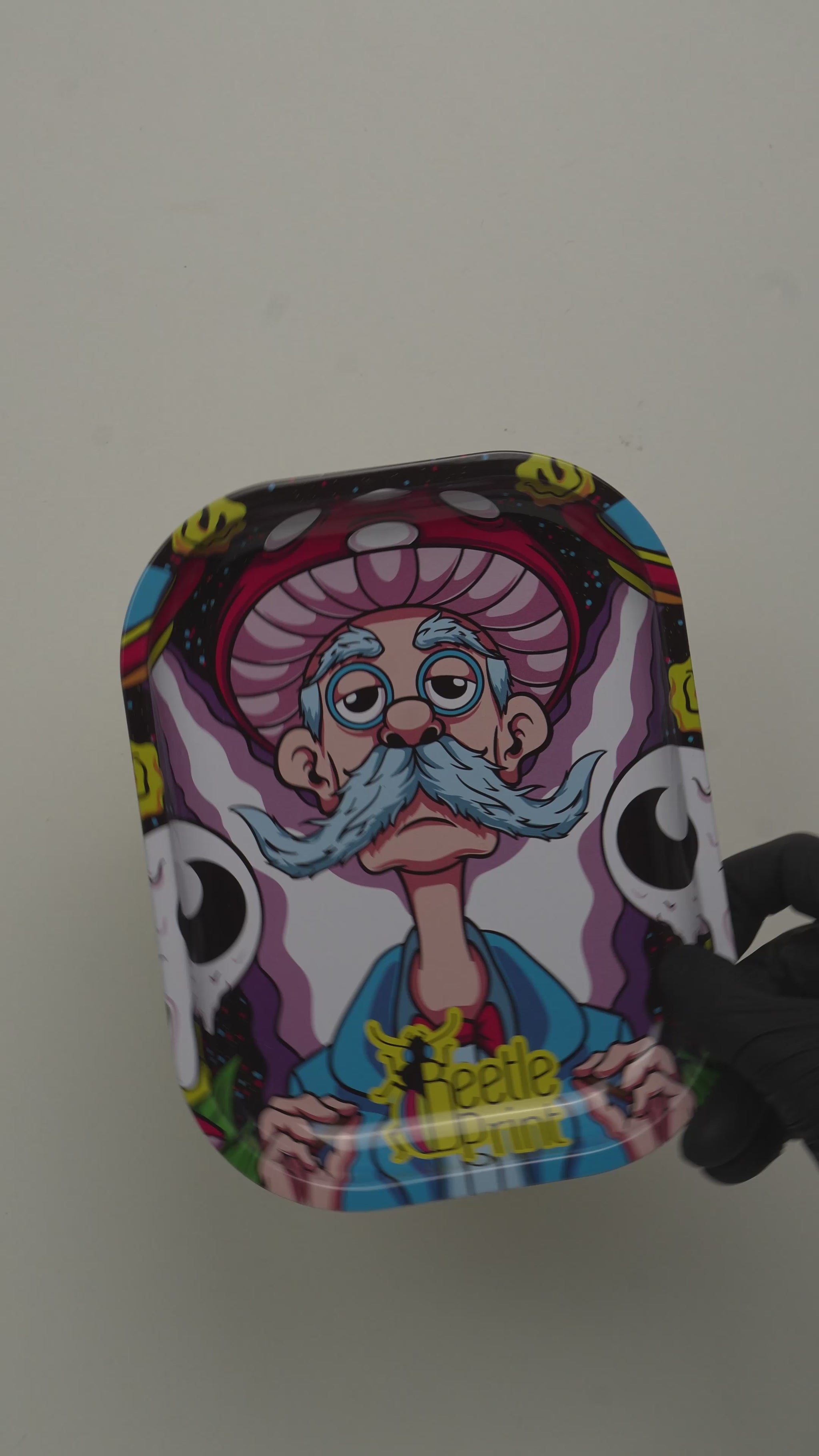 Video showing psychedelic cartoon rolling tray design by Beetle Print