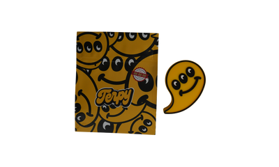 Packaging Terpy con diseño smiley amarillo y pegatina de silicona en forma de fantasma amarillo.