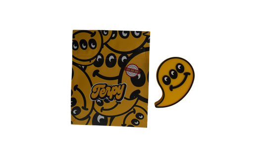 Packaging Terpy con diseño smiley amarillo y pegatina de silicona en forma de fantasma amarillo.